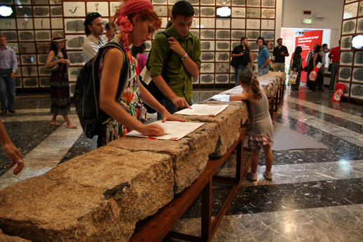 Installation view: stones subjected to the nuclear bomb explosion brought from Hiroshima