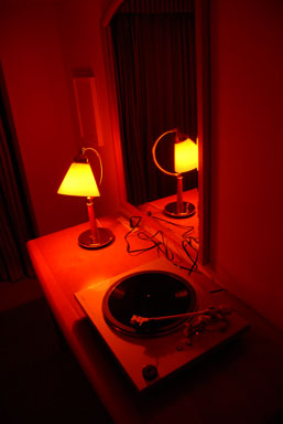 Lit in red, Gallery Sora's room featured a music installation by Mario Garcia Torres.