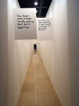 A more playful way to make one's point: Miranda July's hallway story uses disarming wit and charm...