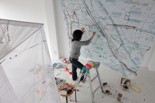 Sayaka Akiyama installing her work in Higure 17-15 CAS (Contemporary Art Studio).