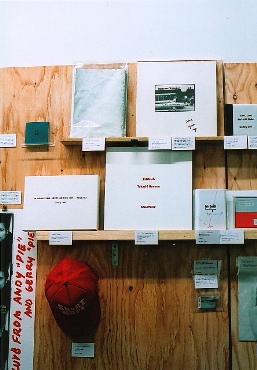 Gallery 360's wall of books and zines. Pioneers of the 'hat as book' movement.