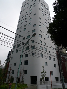 And then this to this stark white building, tall, with funky windows, tucked behind Aoyama Round Theatre