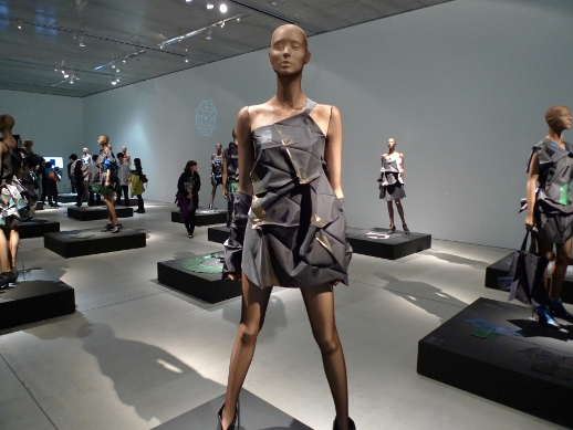 The main room of the exhibition is dedicated to Issey Miyake and his 132 5 team's fold-up-fold-down fashion designs.