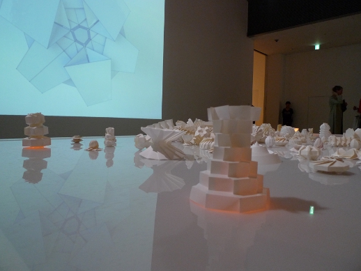 Scientist Jun Mitani collaborated with Wow to produce a series of 'impossible' geometrical shapes and a video showing how they could be folded. 'Spherical Origami' (2010) was developed using an original computer application to create origami that only software can perform.