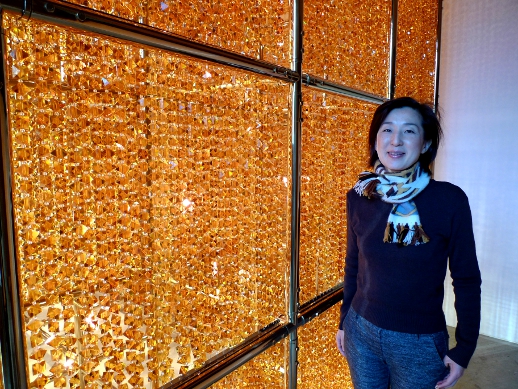 Misa Shin in her gallery in Tokyo, next to 'Cube Light' by Ai Weiwei.