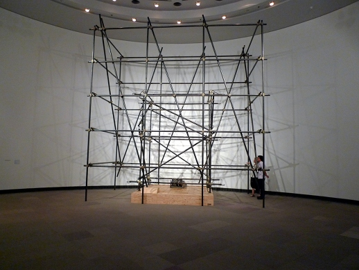 Massimo Bartolini's 'Organi' (2008) is likely the largest work, a scaffolding sound installation that dominates the space. The church organ music comes out of the pipes, forming an ambiguous atmosphere of both prosaic construction and high religion.