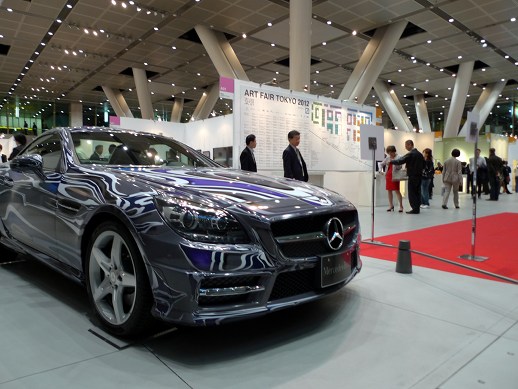 Visitors are first greeted by Tetsuya Nakamura's '2012 Mercedes Benz Japan Art Car SLK 350', setting the tone that this is certainly a commercial event.
