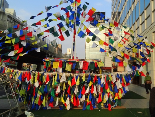 RAN artistic director Katsuhiko Hibino used Bhutanese artist Jampel Cheda's 'prayer flags' to decorate his 'SS Today to Tomorrow' and convey people's hopes for a better future.