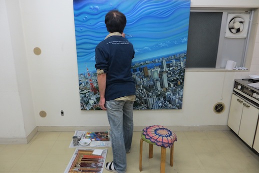 Aki Seki at work on 'City' (2013) Oil on canvas