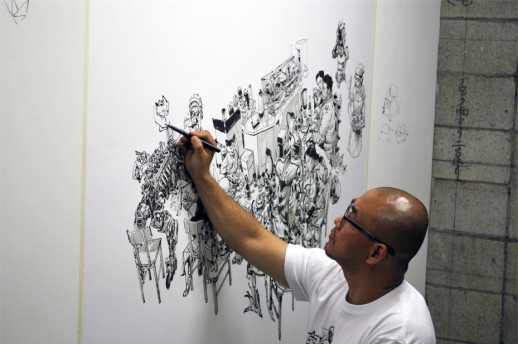 JungGi Kim at work on the second day of the exhibition