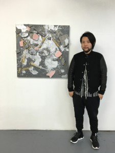 Keisuke Tada with his work
