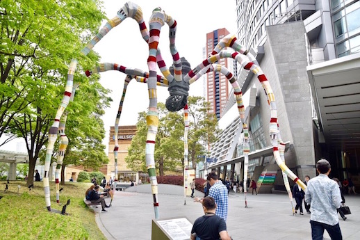 Louise Bourgeois's 1999 bronze sculpture Maman wrapped in fabric by Magda Sayeg in a temporary installation at Roppongi Hills, Tokyo, April-May 2018