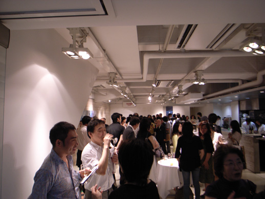 The reception party being held in the cafe below the exhibition space.