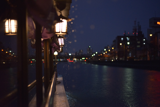The yakatabune cruises through the river at night